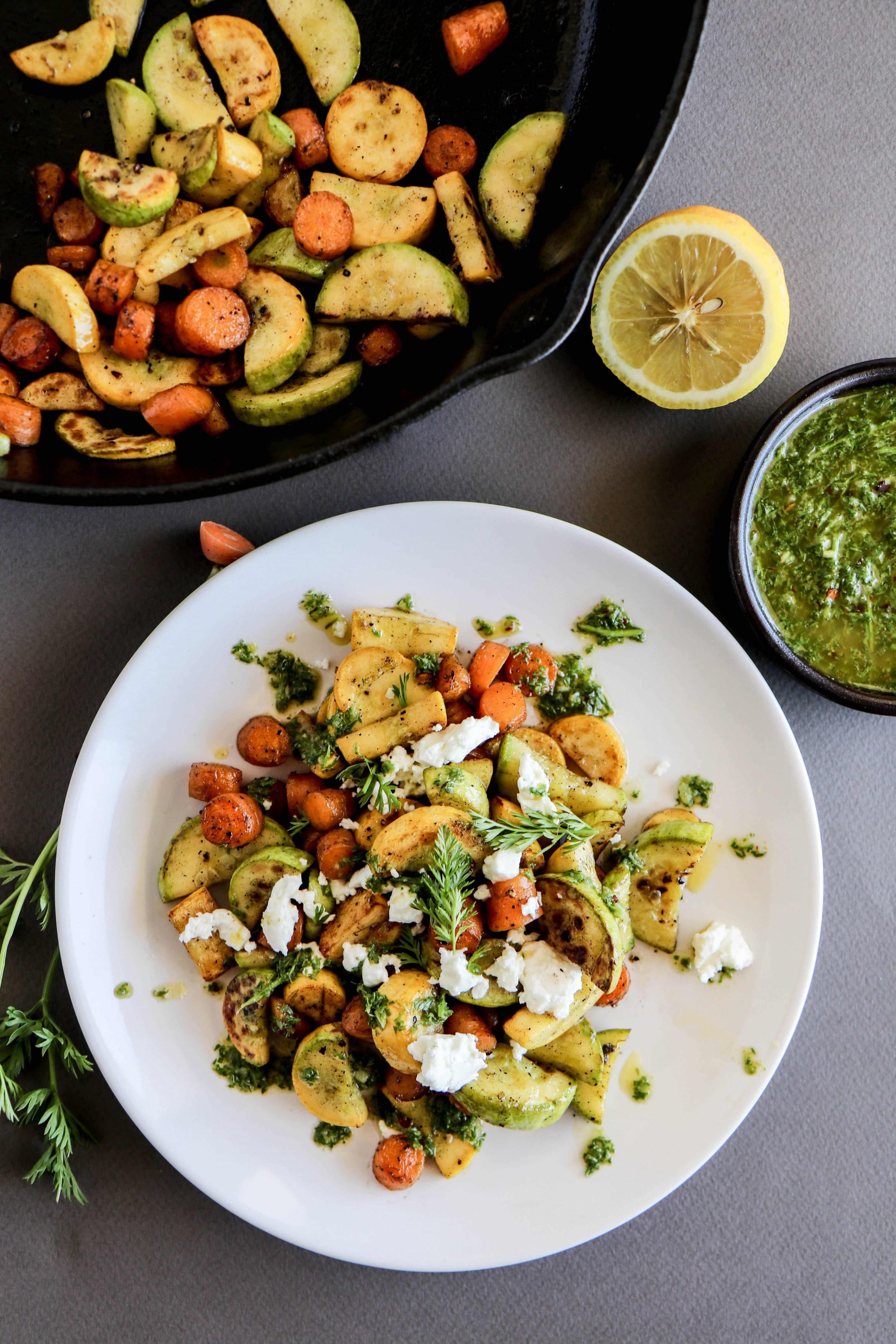 Carrots and squash pan-fried in a simple honey and olive oil glaze with a carrot top chimichurri sauce. You throw your carrot tops away? How dare you!