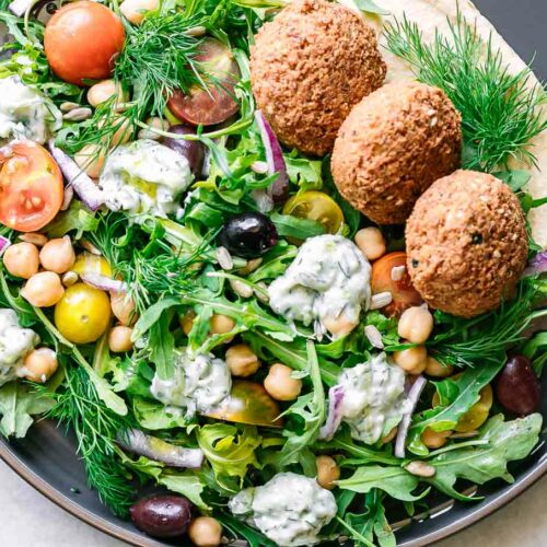 https://www.forkintheroad.co/wp-content/uploads/2023/05/mediterranean-arugula-falafel-salad-116-500x500.jpg